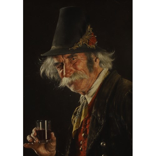 A man with a glass of wine